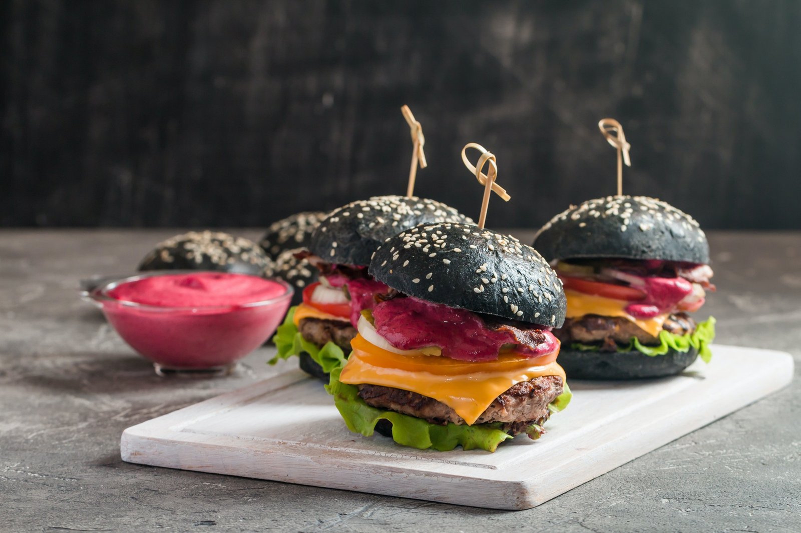 THE NEW BLACK BURGER WITH SPICE TASTE TO SATISFY YOU